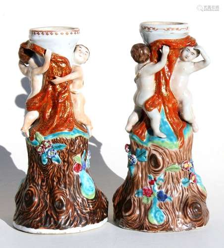 A pair of 18th century Chinese Export tazza bases moulded with cherubs, circa 1780, 31cms (12.25ins)