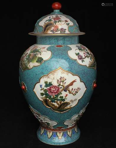 A Chinese baluster vase & cover decorated with relief moulded panels depicting birds, insects and