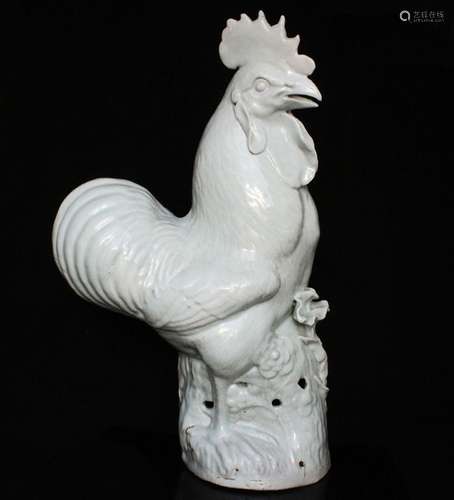 A large 19th / 20th century Chinese pale green glazed cockerel, 41.5cms (16.25ins) high.