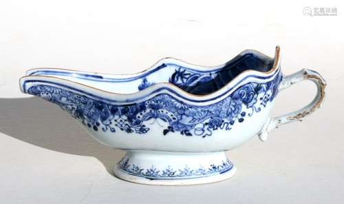 A 19th century Chinese Export blue & white sauce boat, the interior decorated with deer in a