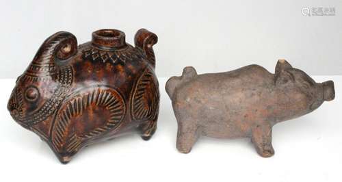 An Asian treacle glazed vessel in the form of a rabbit, 11cms (4.25ins) long; together with a