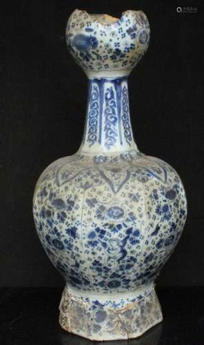 An early Persian style blue & white garlic neck vase decorated with figures and flowers, 33cms (