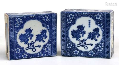 A pair of Chinese blue & white flower bricks or pillows, decorated with fo dogs & prunus, 14cms (5.