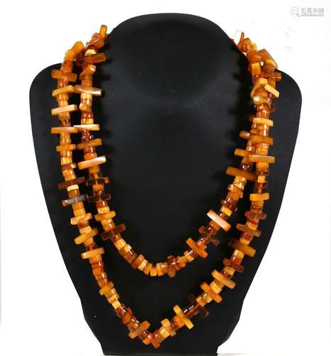 A butterscotch and clear amber bead necklace, approx 108g.