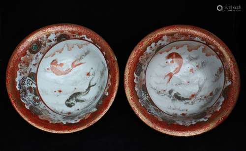 A pair of 19th century Japanese Kutani bowls decorated with goldfish, 24cms (9.5ins) diameter.