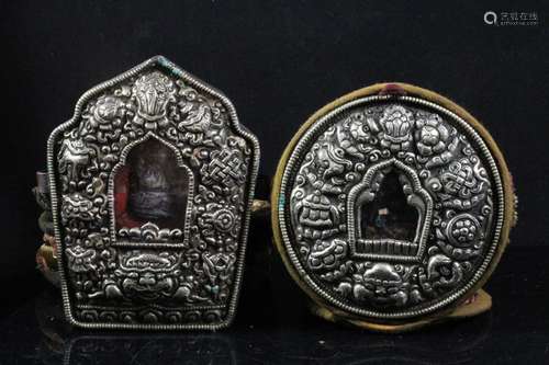 A Himalayan / Nepalese circular travelling shrine, 10cms (4ins) diameter; together with another