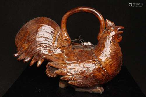 A 19th century Oriental brown glazed stoneware teapot in the form of a cockerel, 26cms (10.25ins)