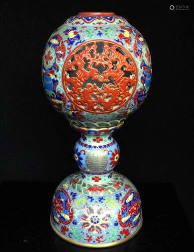 A Chinese famille verte reticulated hat stand on stand with blue four-character seal mark to