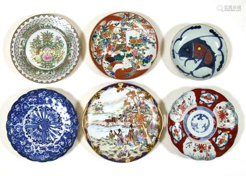 A Chinese famille rose plate; together with a group of Japanese plates including Imari (6).