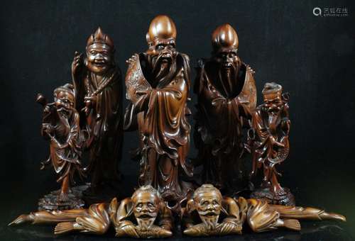 A group of Chinese rootwood figures, the largest 19cms (7.5ins) high (7).