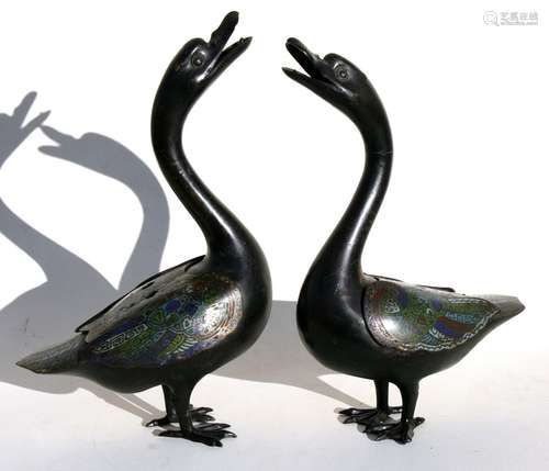 A pair of Chinese bronze & enamel censers in the form of geese, 39cms (15.25ins) high (2).