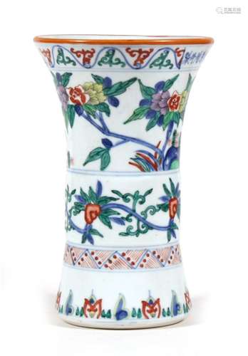 A Chinese vase decorated birds, flowers and foliage. 24cm (9.5 ins) high