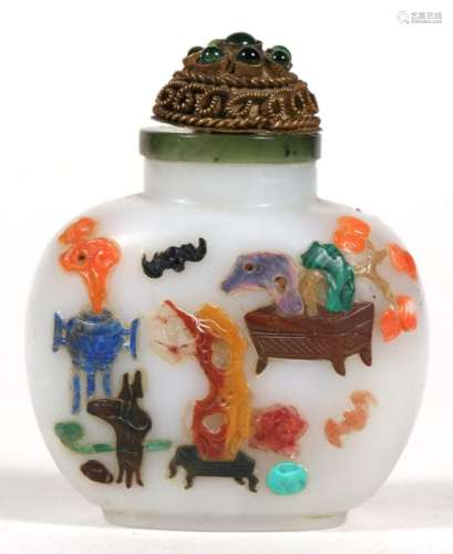 A Chinese jade snuff bottle with coral and hardstone inlay depicting precious objects, flowers and a