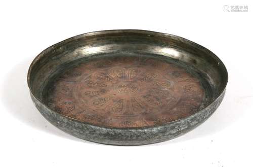 An 18th / 19th century Persian tinned copper tray with panels depicting animals and birds, 31cms (