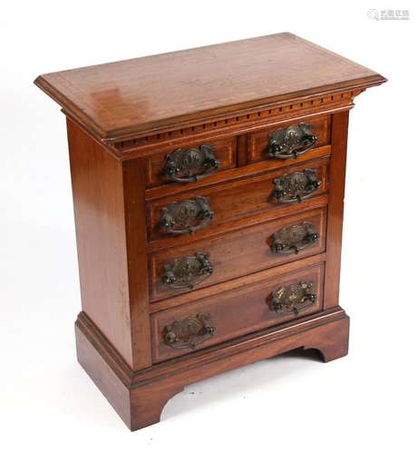 A late 19th / early 20th century mahogany miniature apprentice chest of two short and three long