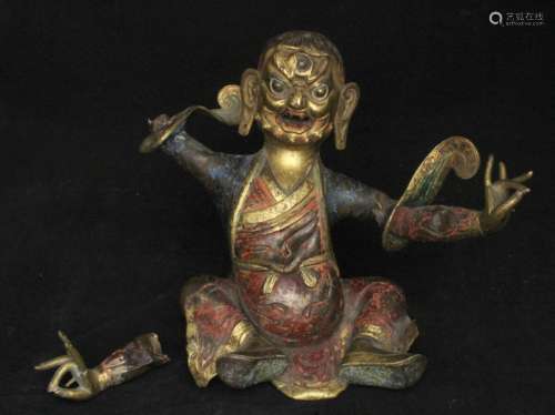 An 18th century Chinese / Tibetan gilded copper Buddha figure, 18cms (7ins) high.Condition Report