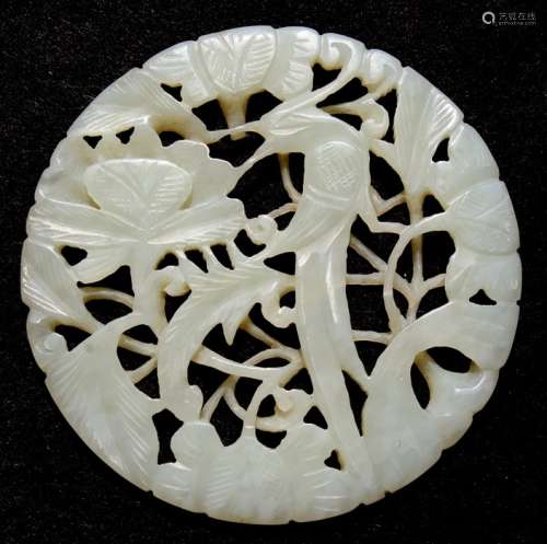 A pierced jade disk, depicting pheasants in foliage. 5.5cm(2.2ins) diameter