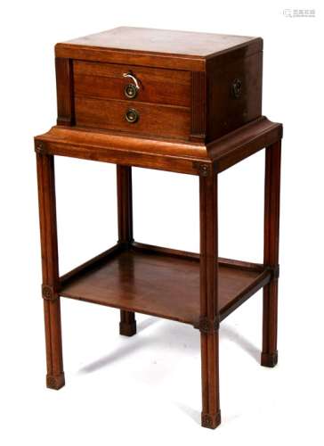 A cutlery chest on stand, the lift-up top enclosing a sectioned interior with two drawers beneath,