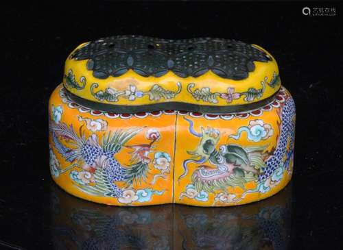 A Chinese enamel cricket cage or censer decorated with a dragon and a phoenix on an orange ground,