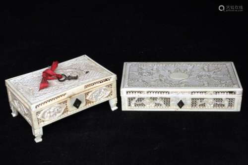 Two 9th century Chinese pierced ivory boxes, one decorated with figures within panels, the other