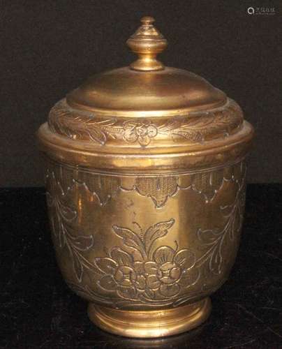 A 19th century Turkish or Ottoman gilt copper tombak pot and cover, inscribed to the underside '