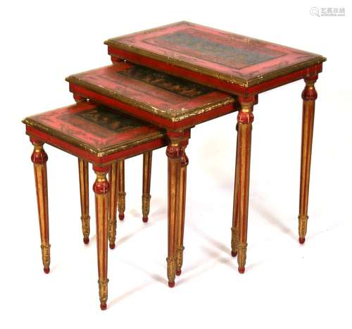 A nest of three Italian painted and giltwood tables, the largest 58cms (22.75ins) wide.