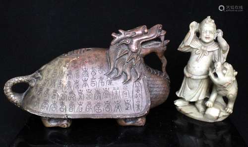 A Chinese carved soapstone figure of a dragon turtle with multiple characters carved to the shell,