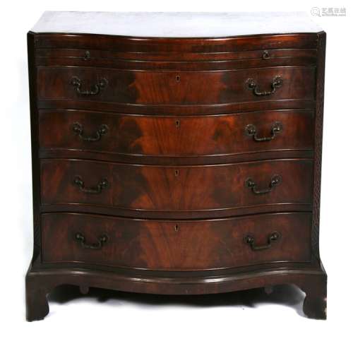 A mahogany serpentine fronted chest, the brushing slide above four long graduated drawers, the