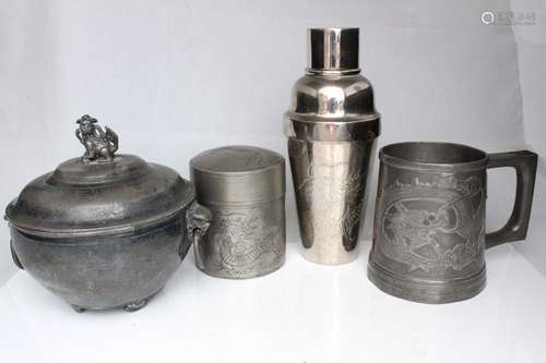 A 19th century Chinese pewter bowl & cover with lion mask handles and fo dog finial; together with a