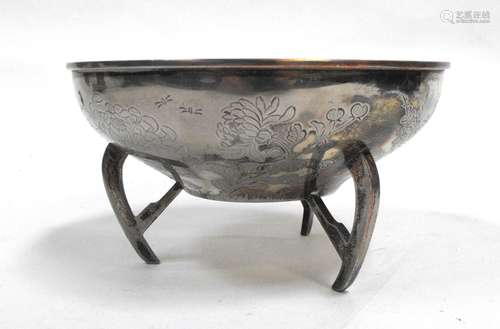 A Japanese silver on copper Ikebana flower bowl on tripod legs, with engraved flower and bird