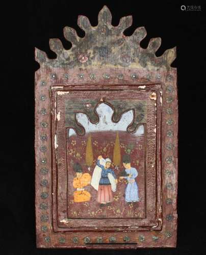 A Persian Qajar papier mache mirror decorated with figures in a landscape with birds & flowers to