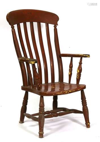 A Victorian painted pine Windsor armchair.