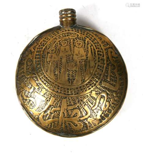 An Eastern brass pilgrim's flask, decorated with figures and Islamic script, 11cms (4.25ins) wide.