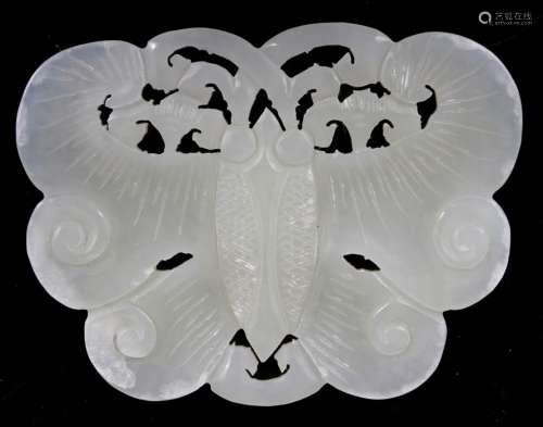 A Chinese pierced jade carving in the form of a butterfly, 7cms (2.75ins) wide.