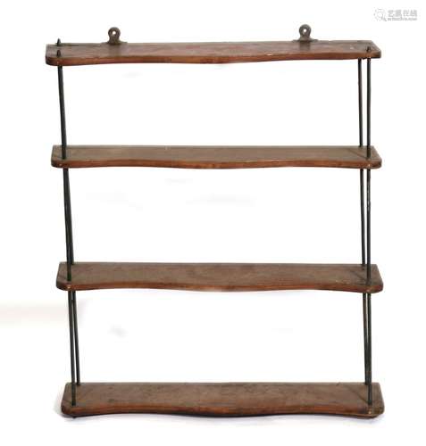 A set of 19th century walnut open wall shelves with brass supports, 64cms (25ins) wide.