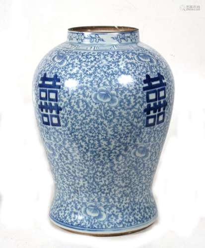 A large Chinese blue & white baluster vase decorated with flowers and foliate scrolls, 40cms (15.