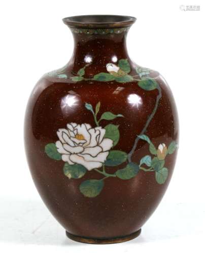 A Japanese cloisonne vase decorated with flowers on a gold speckled brown ground, 19cms (7.5ins)