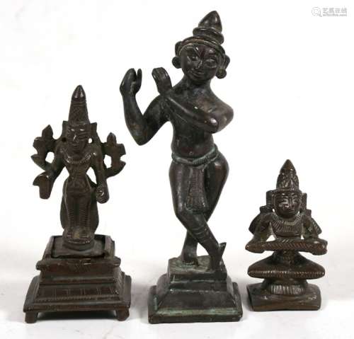 A group of three Indian bronze temple figures, the largest 12cms (4.75ins) high (3).