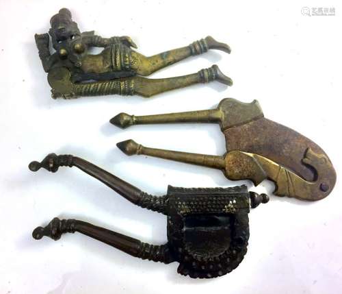 A group of three 19th century Indian betel nut cutters, the largest 16cms (6.25ins) long.