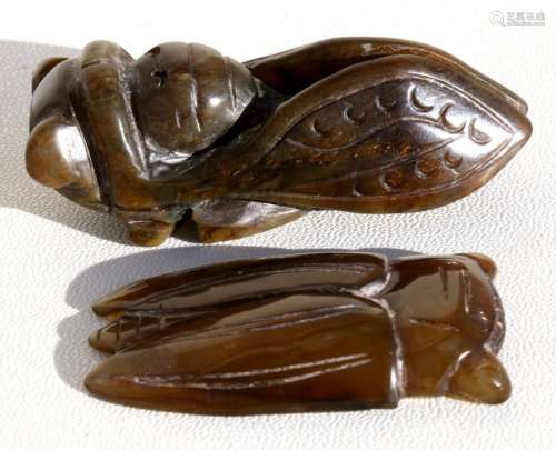 Two Chinese hardstone carvings in the form of Cicadas, 8cms (3.2ins) and 6cms (2.25ins) long.
