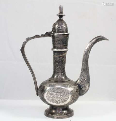 A Persian / Turkish white metal (?) coffee pot decorated with flowers, 19cms (7.5ins) high.