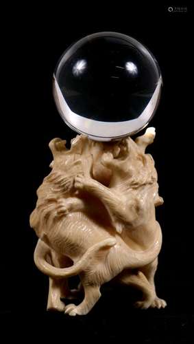 A late 19th / early 20th century Japanese carved ivory group of three male lions carved as a stand