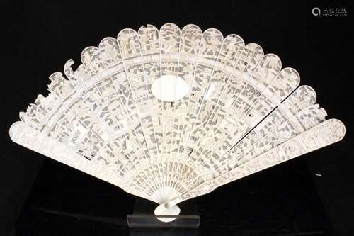 A 19th century Chinese Canton Export pierced ivory brise fan decorated with figures in a