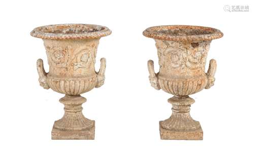A pair of Victorian painted cast iron garden urns, last quarter 19th century