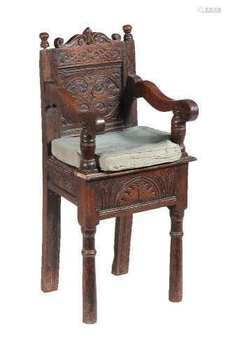 A carved oak child's high chair, late 17th century