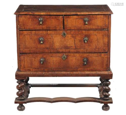 A walnut chest on stand