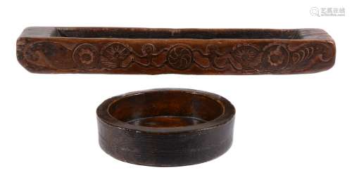 A turned and stained treen vessel or cheese mould, probably 18th century
