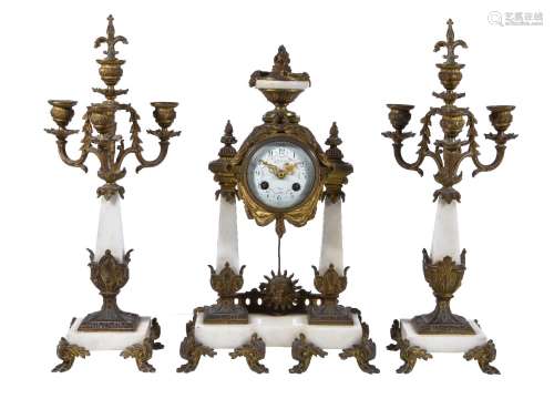 A marble and gilt metal mounted clock garniture, late 19th century