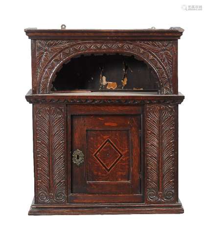 An English oak wall cabinet, circa 1650 and later