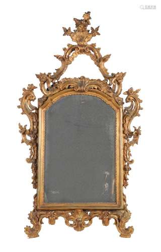 A Continental carved giltwood wall mirror, late 18th/early 19th century